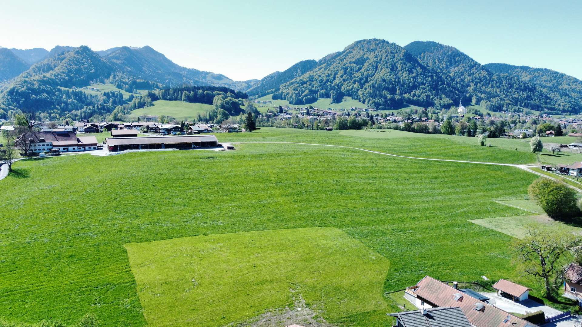 Besondere naturnahe Baugrundstücke in Ruhpolding – Ortsrandlage, unverbaubarer Bergblick & Sonne